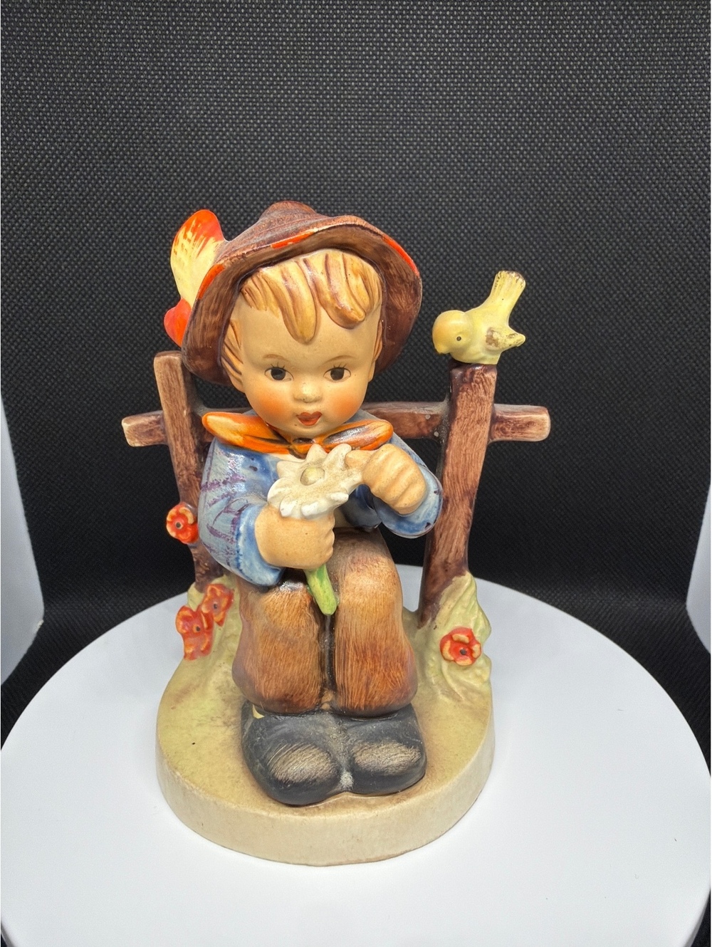 Vintage Hummel Figurine Boy Sitting on Fence with Bird and Flower, Made in West
